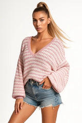 Soft pink checkered V-neck sweater with balloon sleeves for women – cozy and chic fall outfit.